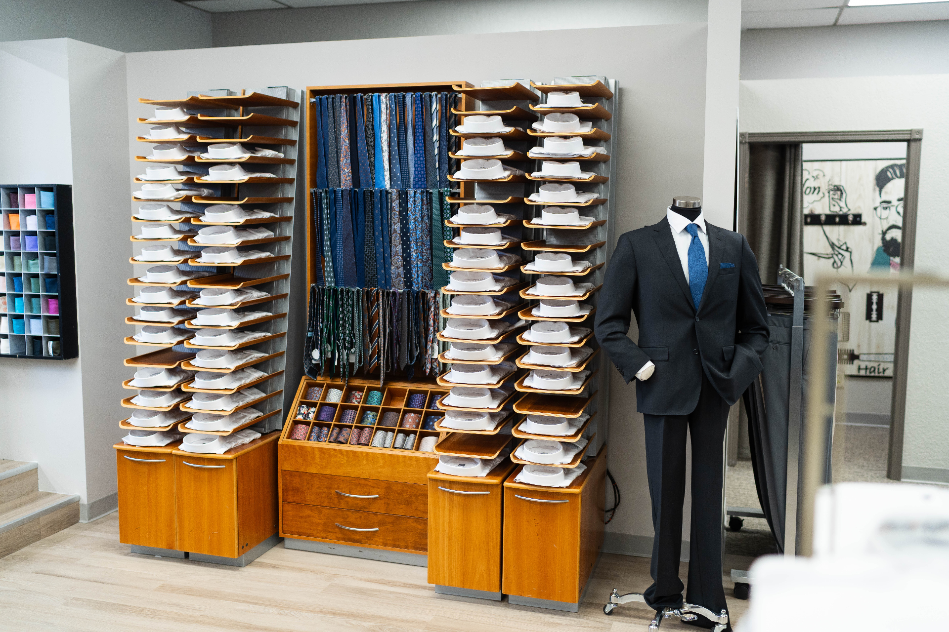 Henry's store interior with shirts and suits