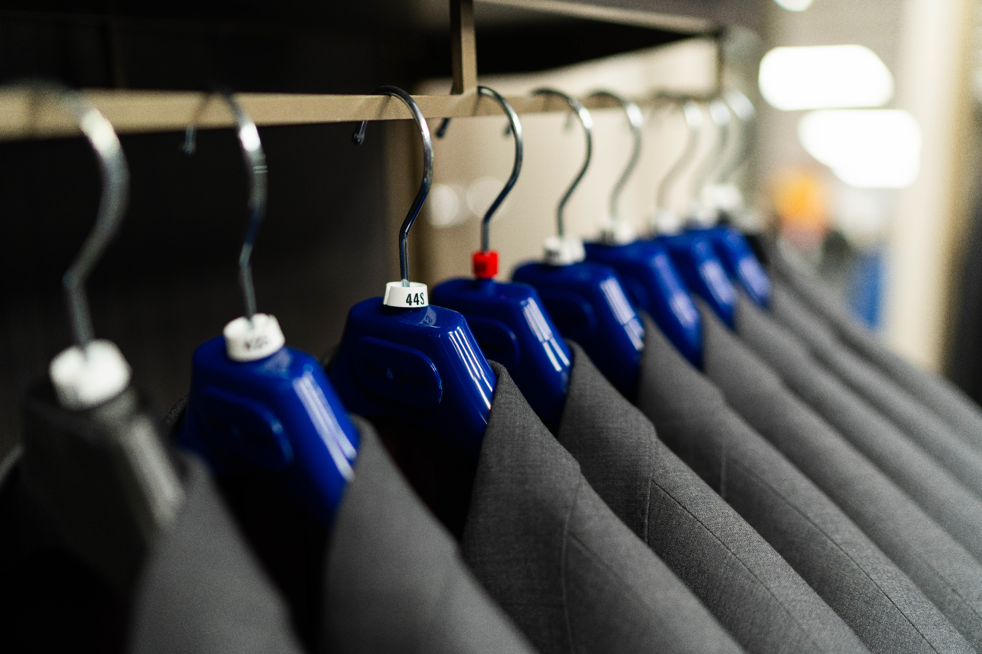 Suits on rack at Henry's